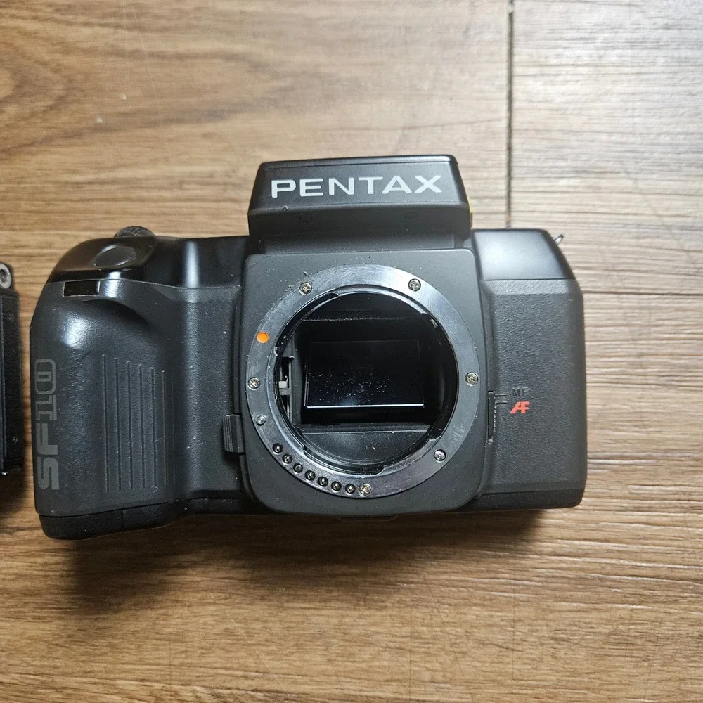 Lot of 2 VTG SLR Film Camera Bodies Konica FS-1 and Pentax SF10 35mm Untested